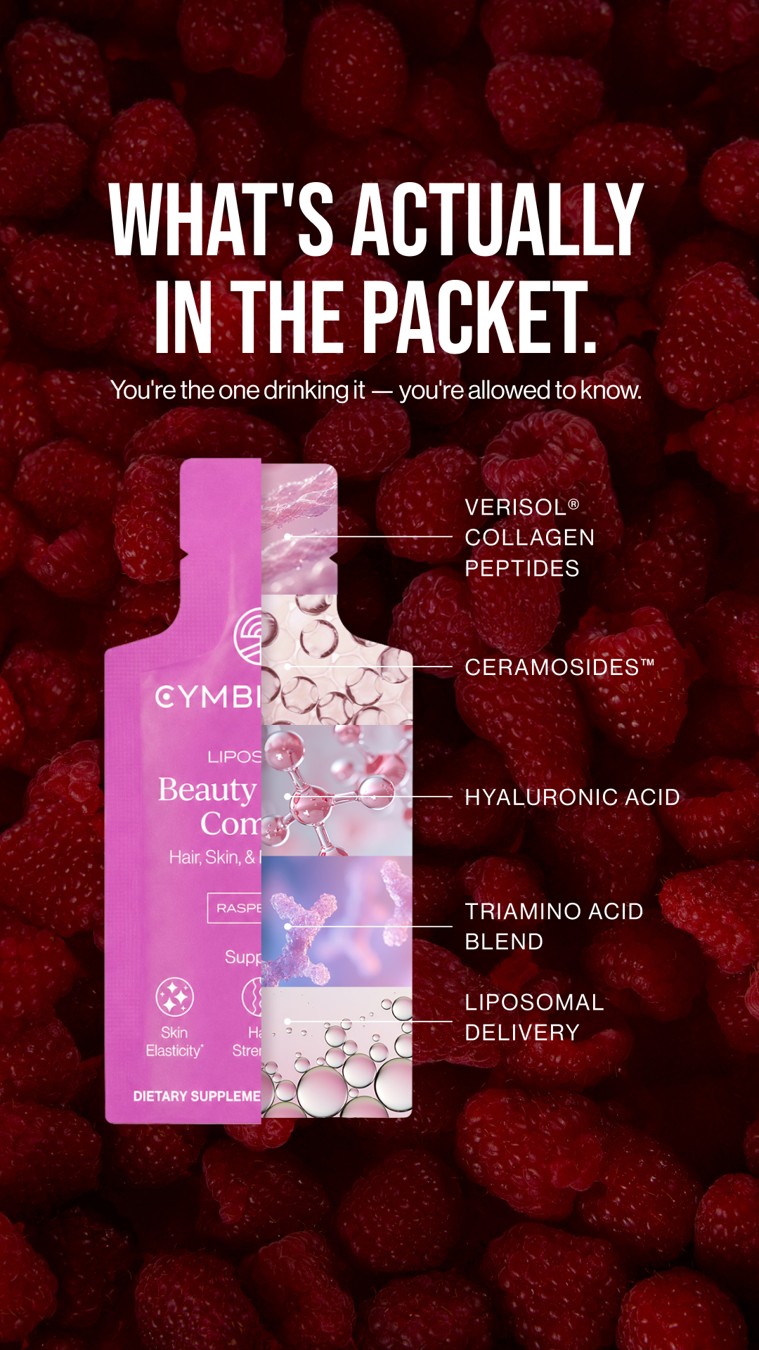 Cymbiotika packet with ingredient callouts over a raspberry-red background.